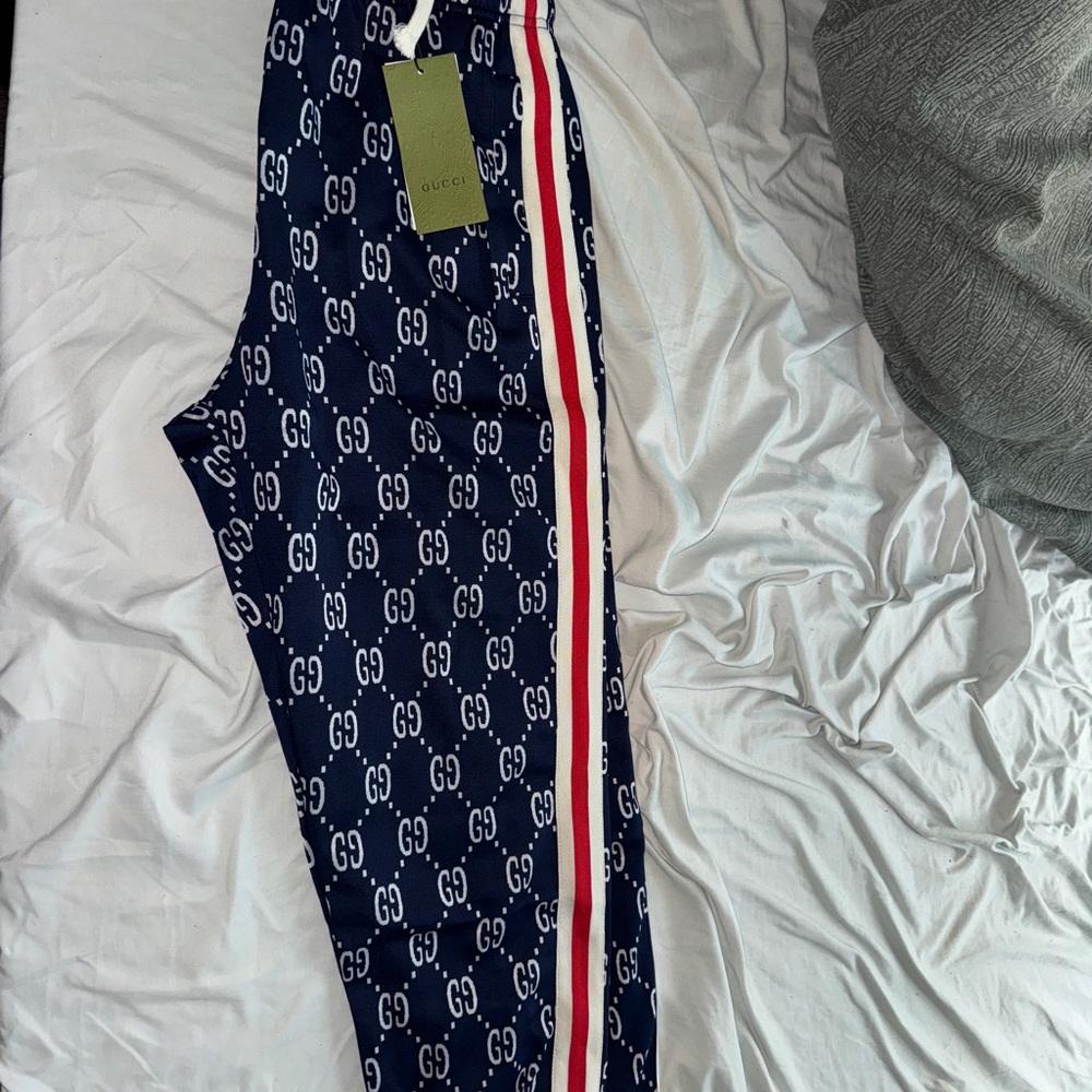 Gucci Blue GG Logo Track Pants with Red and White Stripes